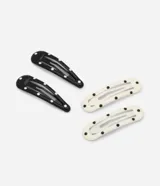 Kit de cuatro pinzas para el pelo tipo tic-tac, de metal, con diseño de lunares en blanco y negro.