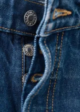 Jeans Orlando de corte wide leg y tiro medio, en tono azul clásico con efecto desgastado.