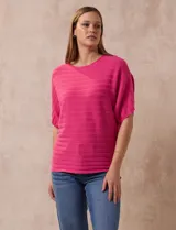 Buzo azul de tejido acanalado marca Ninety, con mangas cortas japonesas.