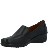 Zapato tipo slip-on de cuero liso color negro, con diseño de punta redondeada y suela de plataforma baja tipo cuña.