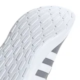 Championes urbanos Adidas modelo Lite Racer 4.0, color gris con las icónicas tres tiras laterales en blanco. Presentan una parte superior de malla textil transpirable y una entresuela Cloudfoam que proporciona una amortiguación ligera y cómoda.
