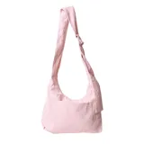 Bolso de hombro tipo hobo color rosado de pana, con un bolsillo externo frontal y correa ajustable.