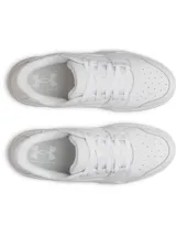 Championes Under Armour modelo UA Flex, color blanco, con parte superior de cuero y suela resistente.