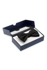 Moño liso de poliéster color azul.