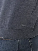 Sweater básico de algodón frizado color bordó, con cuello redondo, puños y ruedo elastizados.