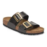 Sandalia Birkenstock modelo Sydney con dos correas ajustables de material sintético Birko-Flor en color negro, hebillas grandes doradas y plantilla anatómica de corcho con suela de goma.