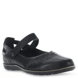 Guillerminas de cuero negro con diseño calado en la parte superior y cierre de tira con velcro. Presentan una suela plana y flexible.