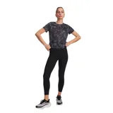 Calza deportiva de tiro alto Under Armour, color negro, con diseño ajustado y largo al tobillo. Presenta costuras laterales reforzadas y logo de la marca en la cintura.