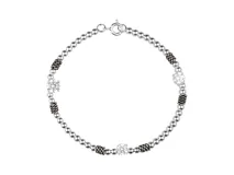 Pulsera de plata 925 con bolitas de plata, tres circonias cuadradas y detalles de hilo metálico texturizado.