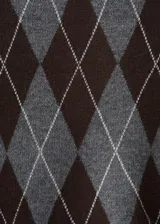 Chaleco de punto fino con estampado de rombos, cuello redondo y mangas cortas.