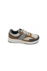 Zapatilla acordonada de mujer con diseño urbano, confeccionada con una combinación de materiales en tonos tierra, marrón, gris y beige. Presenta recortes en contraste, suela de base ancha y detalles deportivos.