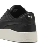 Championes Puma CA Luxe, de cuero color negro con suela plataforma de goma blanca.