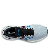 Championes Saucony Triumph 20, color celeste con detalles en azul, negro y rojo.