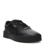 Championes Puma Carina 3.0 Animal Flair de estilo urbano, confeccionados en cuero sintético negro con suela de plataforma robusta y texturizada. Presentan el logo de la marca en dorado en el lateral y cordones al tono.