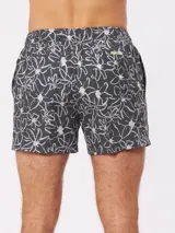 Short de baño Rusty de color gris oscuro, con estampado de flores blancas y cordón ajustable en la cintura.