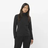 Campera Salomon Essential Lightwarm Hybrid para mujer, de color negro con cierre completo y cuello alto. Combina tejido ripstop y forro polar para mayor calidez y transpirabilidad.
