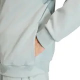 Campera deportiva Adidas con cierre frontal completo, cuello alto y puños elásticos. Presenta un diseño minimalista en color verde claro con el logo de la marca sutilmente grabado en la manga.