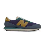 Championes New Balance MS237 de hombre, con capellada de gamuza y pana en color azul, violeta, verde y mostaza.