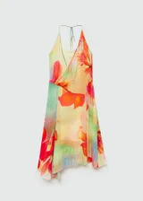 Vestido midi de tejido fluido con estampado floral en tonos pasteles, escote en pico y tirantes finos. Presenta un diseño asimétrico con tajo lateral.