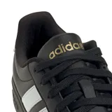 Championes Adidas Streettalk de estilo urbano, color negro con las icónicas tres tiras laterales en blanco. Presentan capellada sintética, puntera con relieve y suela de goma resistente.
