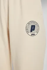 Pantalón deportivo de algodón color crema con logo estampado en azul marino.