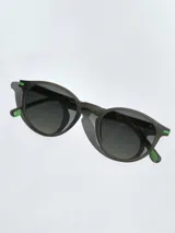Lentes de sol Osten modelo Ibiza, con marco redondo de acabado mate en color gris oscuro y cristales polarizados con protección UV 400.