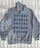 Hoodie de algodón con capucha y estampado de hojas en la espalda. Diseño de calce estándar.