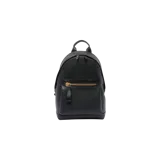 Mochila Tom Ford modelo Buckley, color negro de textura granulada, con cierre principal de doble cremallera y un bolsillo frontal con cierre metálico dorado. Cuenta con asa superior y diseño elegante y funcional.