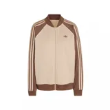 Campera deportiva Adidas SST Loose Tracktop, color beige con mangas y cuello marrón. Presenta las tres rayas características de Adidas en las mangas y el logo bordado en el pecho.