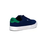 Championes urbanos Pony Champion Casual Canvas, color azul marino con detalles en verde en el talón, suela blanca y logo de la marca en el lateral.