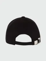 Gorra negra de algodón con visera y logo Balmain bordado en el frente.