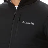 Campera Columbia Ascender Softshell negra, resistente al viento y al agua, con cierre frontal completo, cuello alto, bolsillos laterales con cierre y bolsillo en el pecho con cierre.