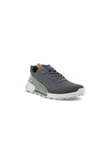 Championes Ecco Biom 21 X Country color gris oscuro con detalles en verde y suela blanca.