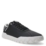 Championes urbanos Caterpillar modelo Hex +, color negro con suela blanca de diseño hexagonal. Presentan el logo de la marca en el lateral y en la lengüeta, con cierre de cordones.