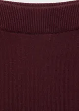 Falda midi de tejido de punto con diseño tipo lápiz y cintura elástica.