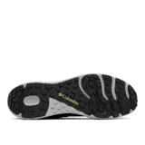 Championes de senderismo Columbia modelo Konos TRS, color gris oscuro con detalles en verde lima. Presentan empeine de malla técnica con sobrecapas sin costuras, sistema Navic Fit para ajuste en el mediopié, mediasuela Techlite+ para amortiguación y suela Adapt Trax para tracción en diversas superficies.