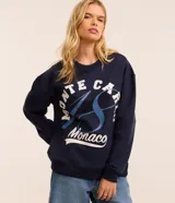 Sweater azul marino de algodón con cuello redondo y mangas largas. Estampa frontal con la frase "Monte Carlo Monaco" en letras blancas y celestes.