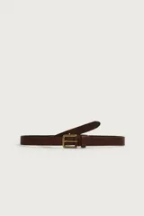 Cinturón de piel color marrón con efecto vintage, hebilla metálica rectangular y pasador, de la colección especial Aaron Levine x Zara.