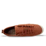 Zapatillas Reef color ladrillo con diseño calado y suela blanca.