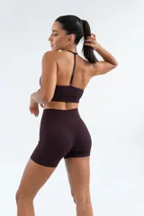 Top deportivo de tejido acanalado en color azul marino, con diseño de espalda estilo nadador y breteles finos regulables.