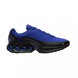 Championes Nike Air Max Dn, modelo en color azul y negro, con diseño moderno y suela con cámaras de aire visibles.