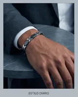 Pulsera de eslabones de acero con piezas centrales en color negro, diseño moderno y elegante.