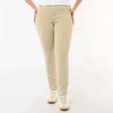 Pantalón skinny de tiro alto color beige, confeccionado en denim elástico, con bolsillos delanteros y traseros.