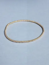 Pulsera elástica de cuentas de 2mm en oro laminado 14 Kilates (Goldfilled).