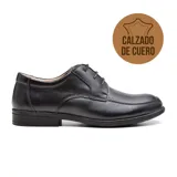 Zapato de vestir acordonado de cuero negro, con suela de goma y puntera cuadrada.
