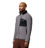 Campera de polar Columbia con cierre frontal completo, cuello alto y bolsillo en el pecho con cierre y panel de contraste. Presenta ribetes elásticos en puños y dobladillo.