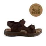 Sandalias casuales de cuero marrón con ajuste de velcro en el empeine y tobillo. Suela de goma con diseño antideslizante.