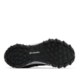 Championes de senderismo Columbia modelo Peakfreak Hera, color negro con detalles en fucsia y suela gris. Presentan tecnología impermeable OutDry, sistema de ajuste Navic Fit y suela Adapt Trax para mayor tracción.
