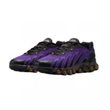 Championes Nike Air Max Dn8 de diseño moderno y deportivo. Presentan una combinación de colores en negro y violeta, con una suela técnica que incorpora cápsulas de aire visibles en tono bronce para mayor amortiguación.