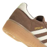 Championes Adidas modelo Handball Spezial Bold, color marrón con diseño de plataforma de goma. Presentan el exterior en gamuza con las icónicas tres rayas laterales en color crema y detalles dorados.